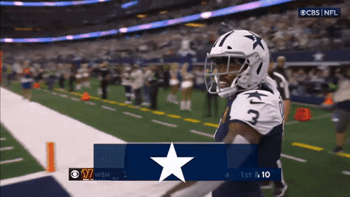 Football Player Number 3 On Helmet Standing On Field GIF