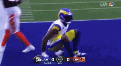 Football Player Number 3 Running on Field