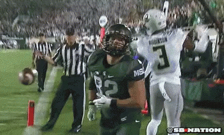 Football Player Number 3 Standing on Field