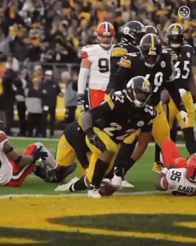Football Player Number 35 Being Tackled GIF