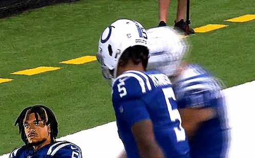 Football Player Number 5 Talking To Another Player GIF