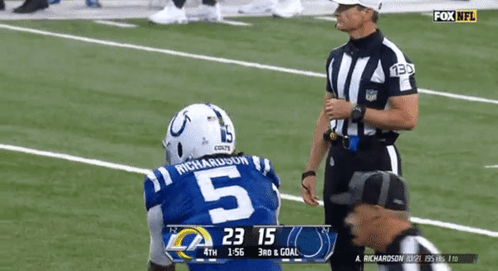 Football Player Number 5 Talking To Referee GIF