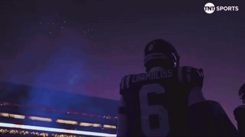 Football Player Number 6 in Front of TNT Sports Logo