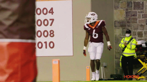 Football Player Number 6 on Field