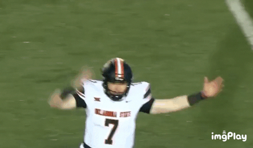 Football Player Number 7 Arms Outstretched GIF