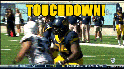 Football Player Number 71 Being Tackled