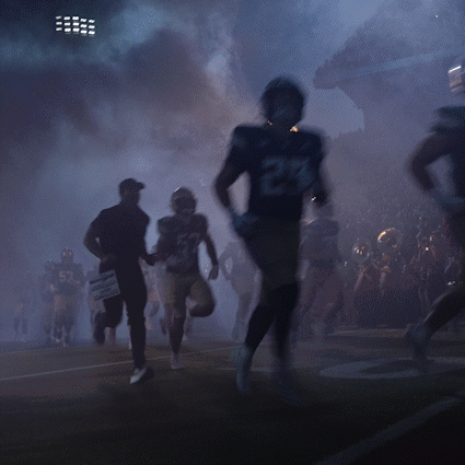 Football Player Number 72 Running