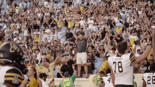 Football Player Number 78 Jersey in Front of Crowd