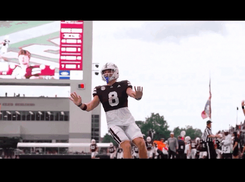 Football Player Number 8 Jumping