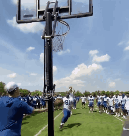 Football Player Number 81 Catching Ball