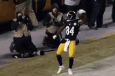 Football Player Number 84 Dancing on Field