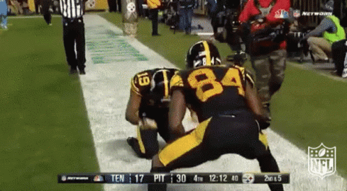 Football Player Number 84 Kneeling