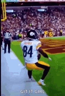 Football Player Number 84 Kneeling
