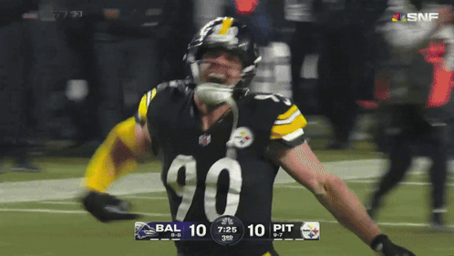 Football Player Number 90 Celebrating