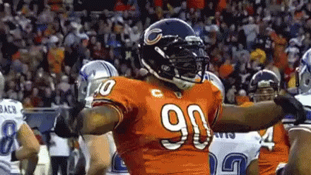Football Player Number 90 In Front Of Crowd GIF