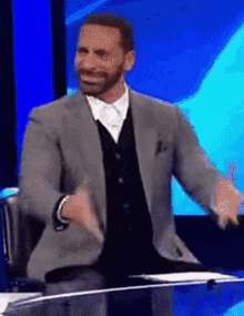Football Player Rio Ferdinand Rubbing Hands Laughing GIF