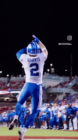 Football Player Roberts Jumping in Air