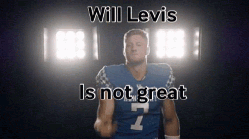Football Player Running In Front Of NFL Logo Wall GIF