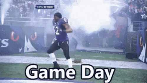 Football Player Running in Purple Uniform