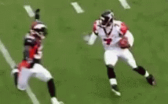 Football Player Running Towards Another Player GIF