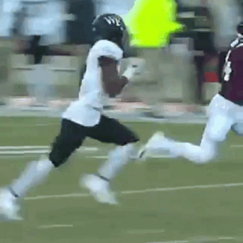 Football Player Running With Ball GIF