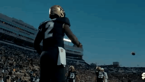 Football Player Running with Ball