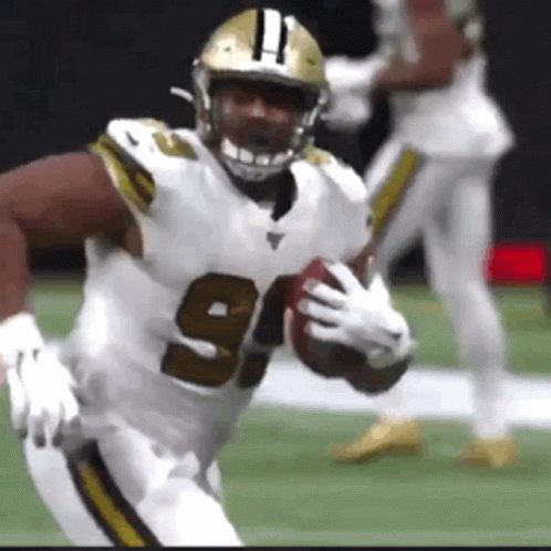 Football Player Running With Ball