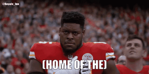 Football Player Saying Home of the in Front of Crowd