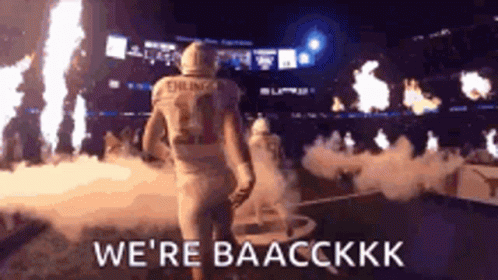 Football Player Walking Out of Stadium We 're Baacckkk