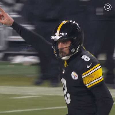 Football Player Wearing Black Jersey Number 8