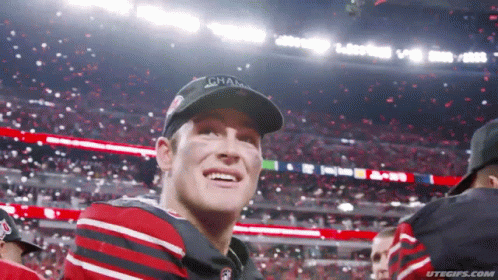 Football Player Wearing Champions Hat GIF