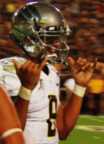 Football Player Wearing Helmet Number 5 GIF