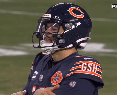 Football Player Wearing Helmet Saying GSH