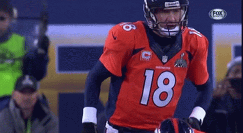 Football Player Wearing Jersey Number 18