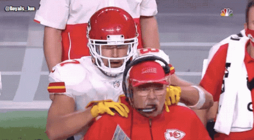 Football Player Wearing Kansas City Chiefs Helmet