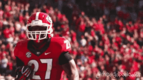 Football Player Wearing Number 27 Jersey