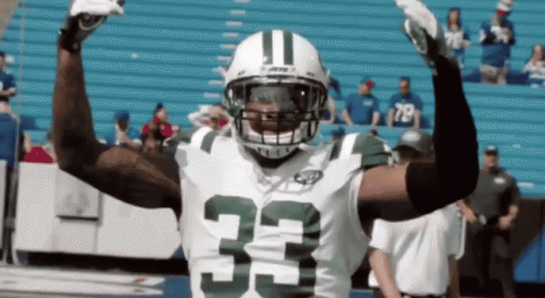 Football Player Wearing Number 33 Jersey