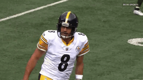 Football Player Wearing Number 8 Jersey Running