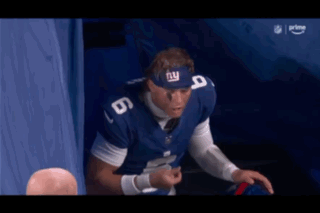 Football Player Wearing NY Headband