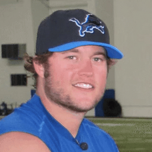 Football Player Wearing Rams Helmet