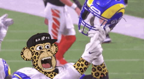 Football Player Wearing Rams Helmet