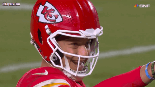 Football Player Wearing Red Helmet With KC Logo GIF