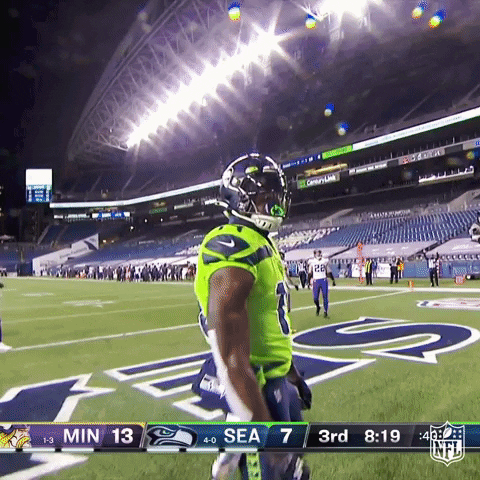 Football Player Wearing Santa Hat Number 41 GIF