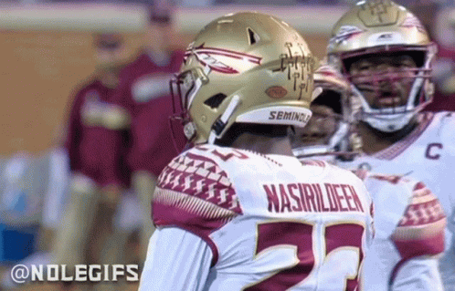 Football Player Wearing Seminole Helmet