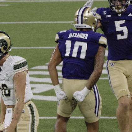 Football Player With Alexander On Jersey