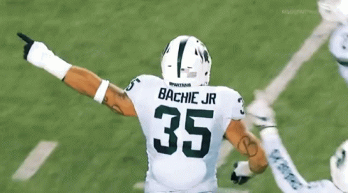 Football Player With Bachie Jr on Back
