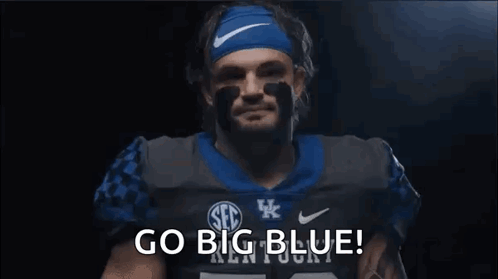Football Player With Blue Nike Headband