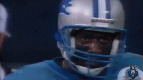 Football Player With Detroit Helmet