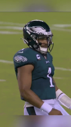 Football Player With Helmet and Jersey Number 1