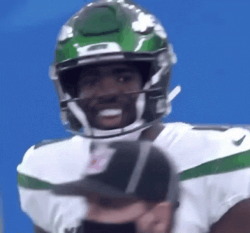 Football Player With Helmet and Mask